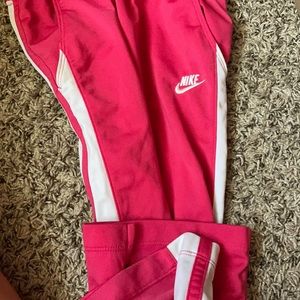 Pink Nike p.m. has been worn